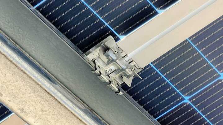 VesprSolar V-Max clamp attached to a solar panel